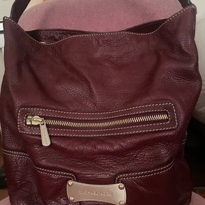Michael Kors hobo style bag. Great condition Dark red